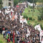 Members of NO TAV movement march during a rally towards the Chiomonte TAV worksite in Susa Valley, Piedmont Region, northern Italy, 27 July 2019. Italy would incur 'huge costs' to stop the Turin-Lyon high-speed train (TAV) link unilaterally in the face of French determination to complete the project, Italian Premier Giuseppe Conte said on 24 July, explaining his view that it would cost more to stop the TAV than to complete it. ANSA/ ALESSANDRO DI MARCO